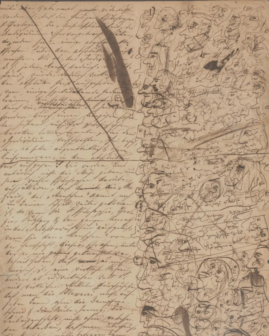 Page manuscrite de L'Idéologie allemande, 1845-1846 : l'écriture de Marx et des croquis d'Engels.
