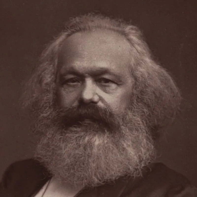 Karl Marx en 1875, portrait de John Jarvis Mayall : cheveux et barbe blancs, la main dans le gilet.